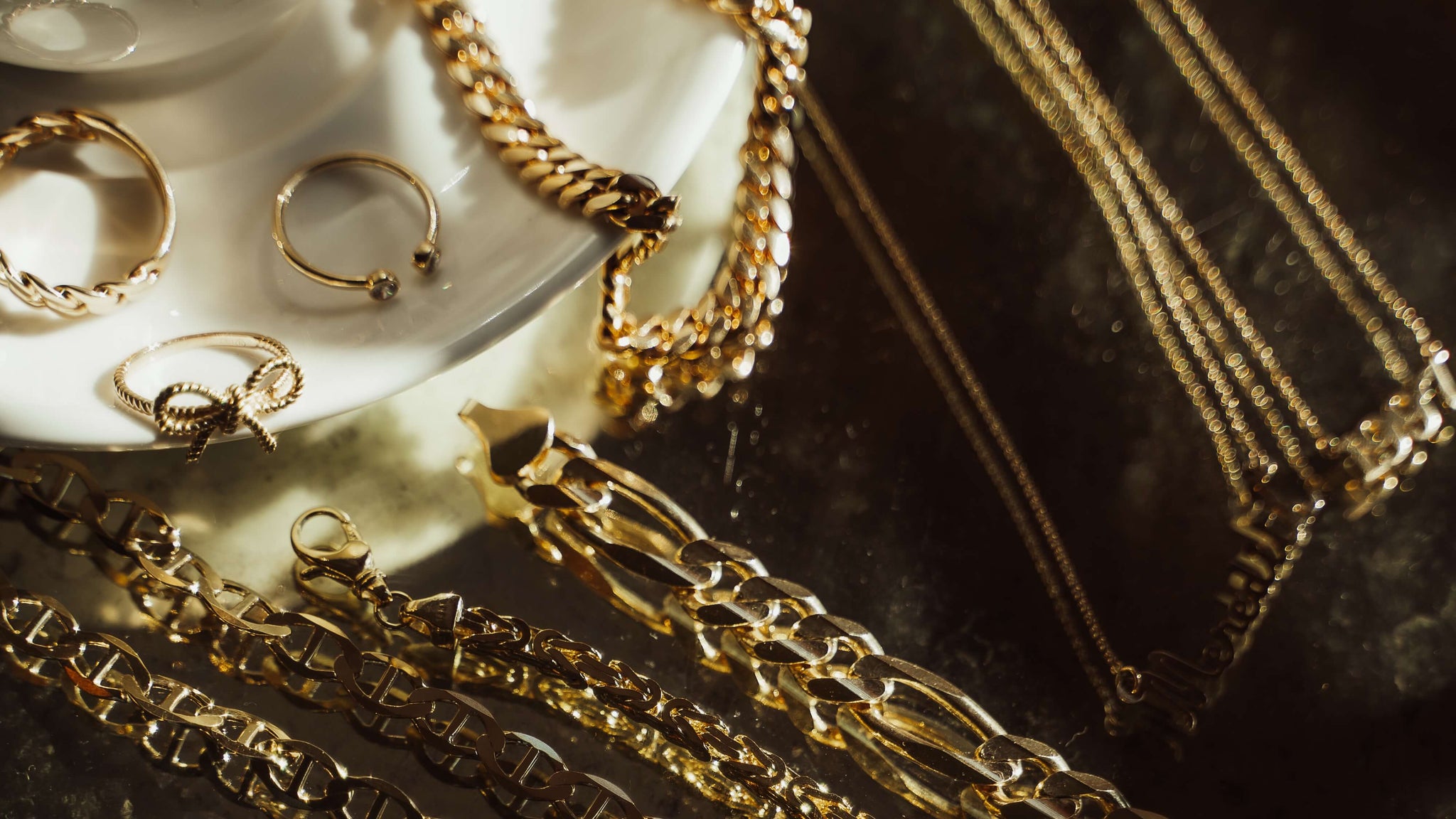 Solid gold chains, rings, and necklaces including Cuban link, Figaro, mariner, and rope styles — shop all genuine gold jewelry at Liry's Jewelry