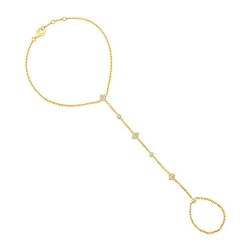 Clover and Diamond Hand Chain in 14kt yellow gold with pavé clover motifs on white background