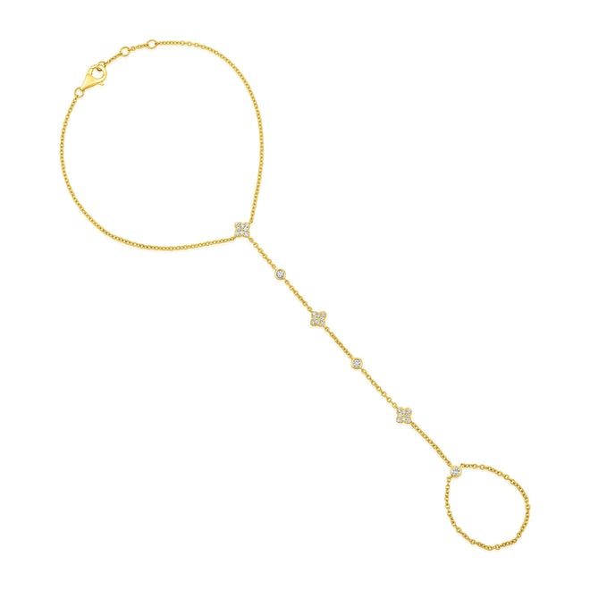 Clover and Diamond Hand Chain in 14kt yellow gold with pavé clover motifs on white background