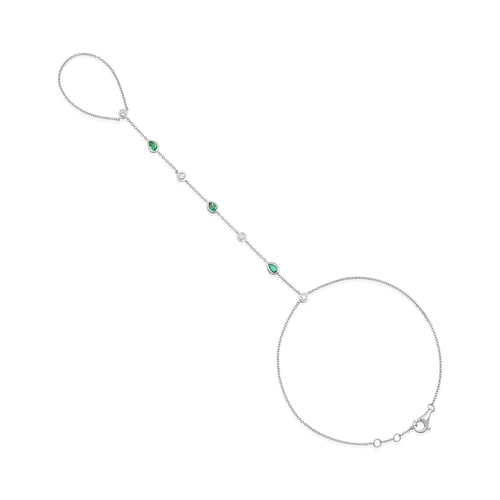 Emerald and Diamond Hand Chain in 14kt white gold with natural emeralds on white background