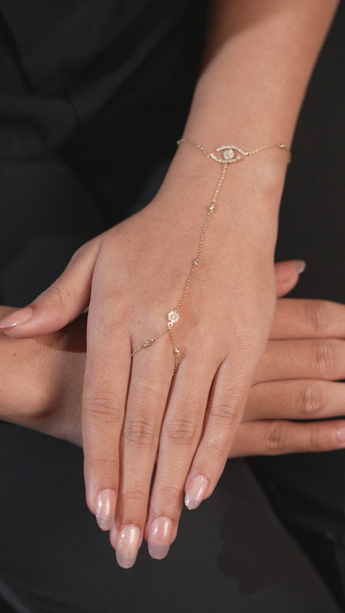 Video of Evil Eye Diamond Hand Chain in 14kt yellow gold worn on hand